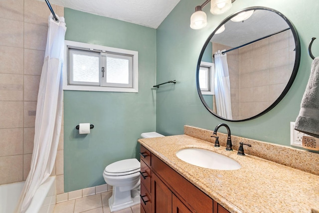 full bath with tile patterned flooring, shower / bath combo with shower curtain, toilet, vanity, and a textured ceiling