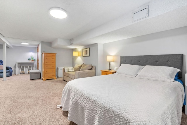 bedroom featuring visible vents and carpet