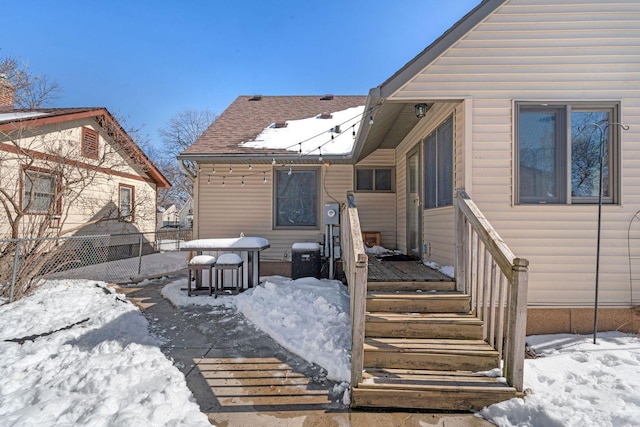 view of snow covered deck