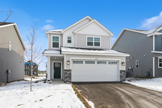 craftsman-style home with a garage