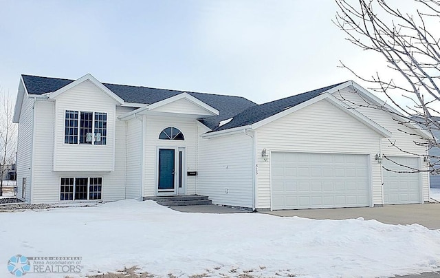 view of front of property featuring a garage