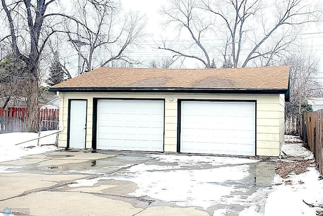 view of snow covered garage