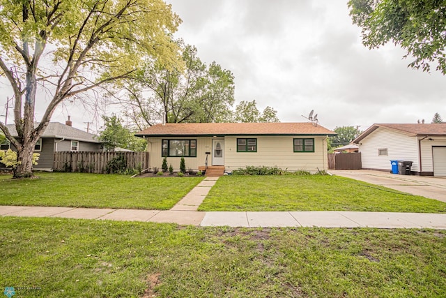 ranch-style house with a front yard