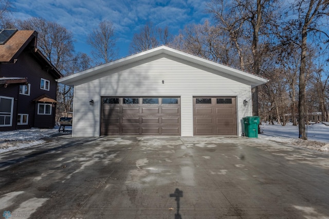 view of snow covered garage