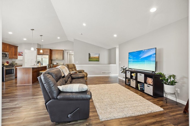 living room with lofted ceiling and dark wood-type flooring