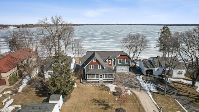 birds eye view of property featuring a water view