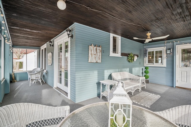 view of patio / terrace with french doors and ceiling fan