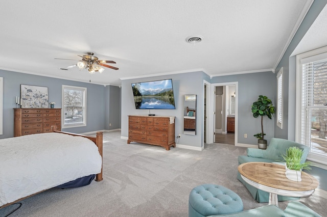 bedroom featuring visible vents, ceiling fan, baseboards, ornamental molding, and carpet floors