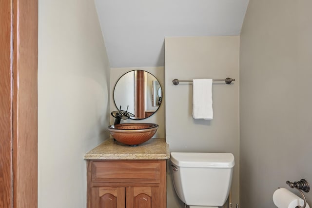 half bath with toilet and vanity