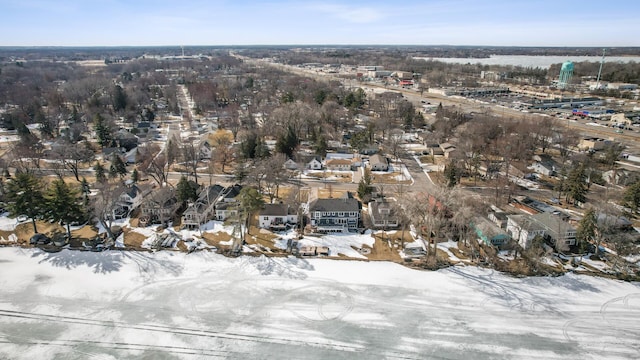 snowy aerial view featuring a residential view