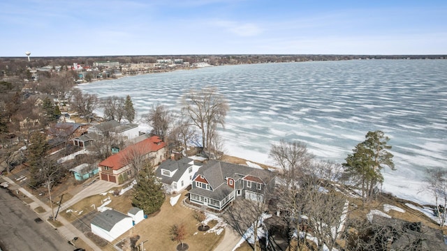 bird's eye view with a water view