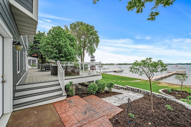 255 Shore Dr, Forest Lake, MN 55025 - view of grassy yard featuring a deck with water view