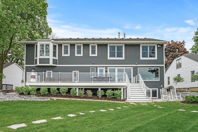 255 Shore Dr, Forest Lake, MN 55025 - rear view of house with a yard, a wooden deck, and stairs