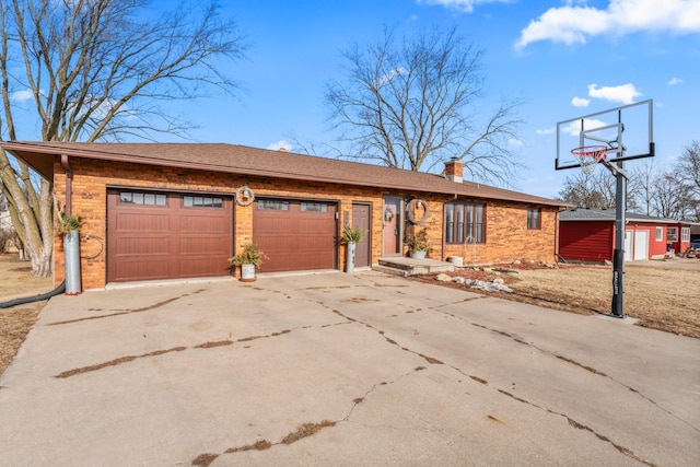 single story home with a garage