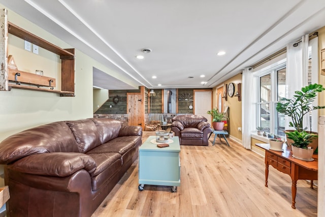 living room with light hardwood / wood-style flooring