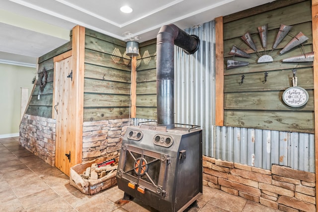 room details with a wood stove and wooden walls