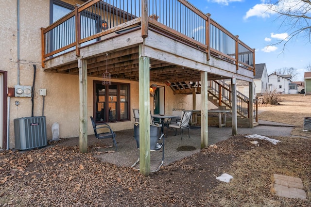 view of patio featuring cooling unit and a wooden deck