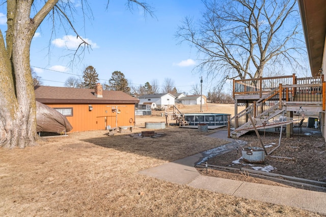 view of yard featuring a deck