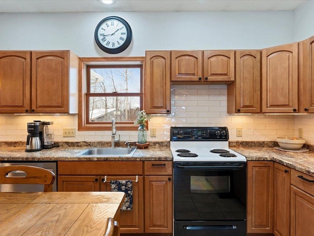 kitchen with sink, range with electric cooktop, tasteful backsplash, and dishwasher