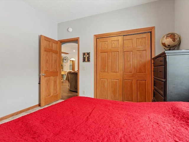 unfurnished bedroom featuring a closet