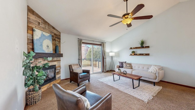 living room featuring light carpet, high vaulted ceiling, a large fireplace, and ceiling fan