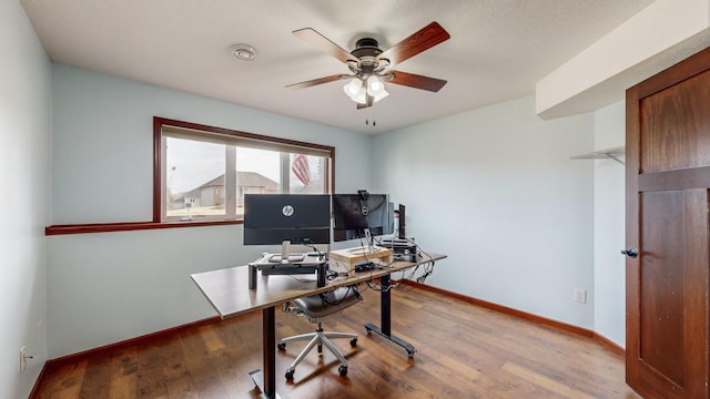 office area featuring wood-type flooring and ceiling fan