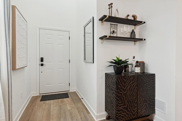 entryway with light wood-type flooring