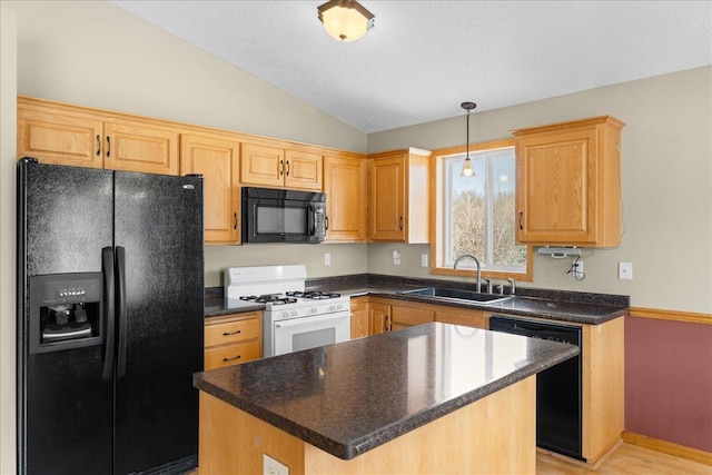 kitchen with lofted ceiling, sink, decorative light fixtures, a center island, and black appliances