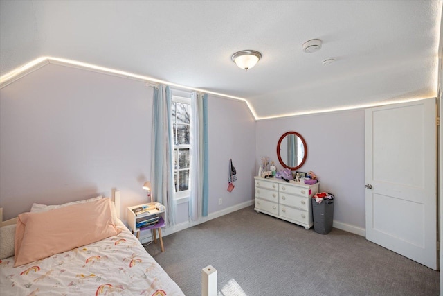 bedroom featuring lofted ceiling and carpet flooring