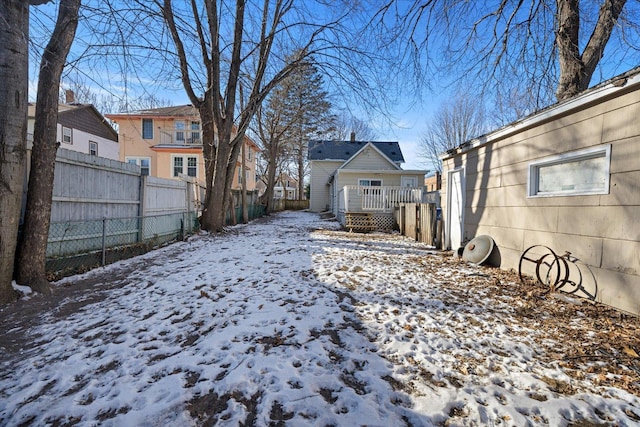 view of yard layered in snow