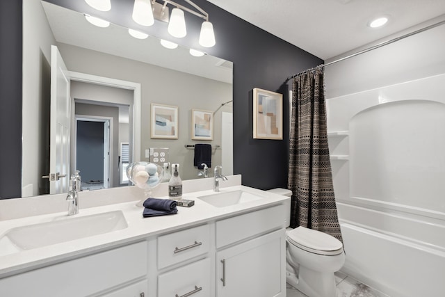 full bathroom featuring vanity, toilet, and shower / bath combo with shower curtain