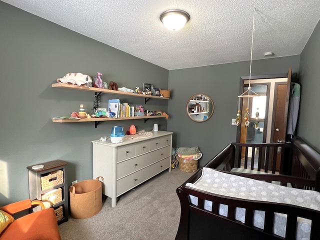 carpeted bedroom with a textured ceiling