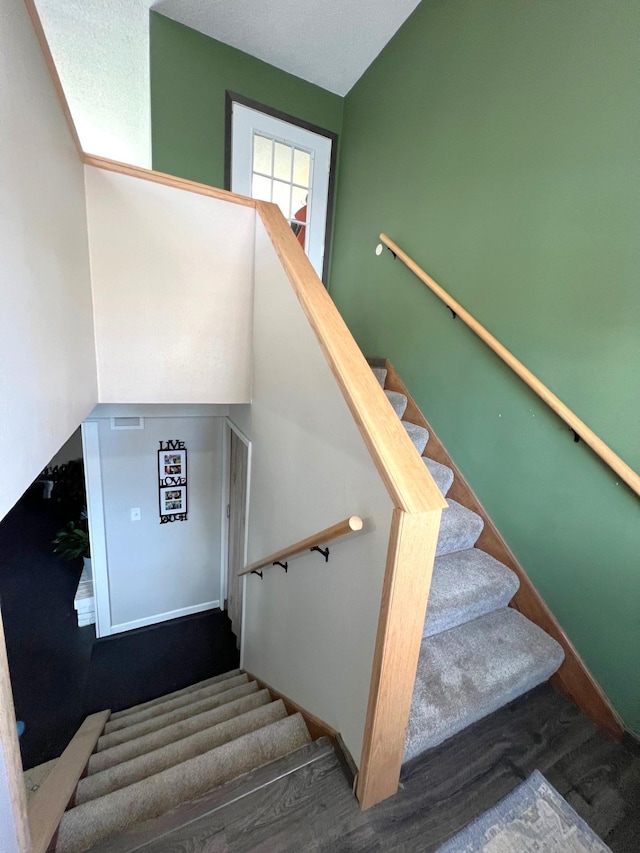 stairway with baseboards