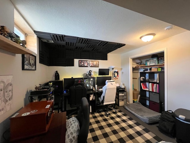 home office with a textured ceiling