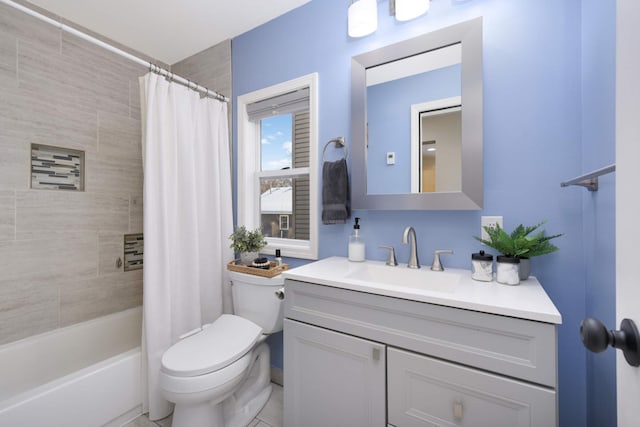 full bath featuring vanity, toilet, and shower / bath combo with shower curtain