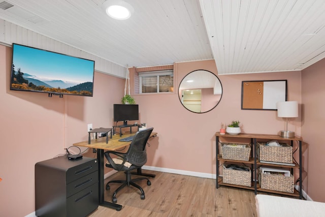 home office featuring wooden ceiling, baseboards, visible vents, and light wood finished floors