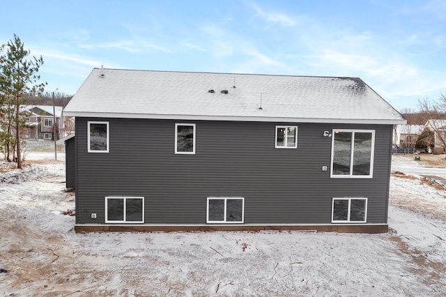 view of snow covered property