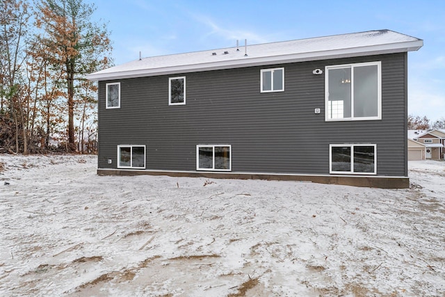 view of snow covered property