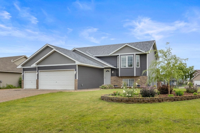 view of front of home featuring a garage and a front yard