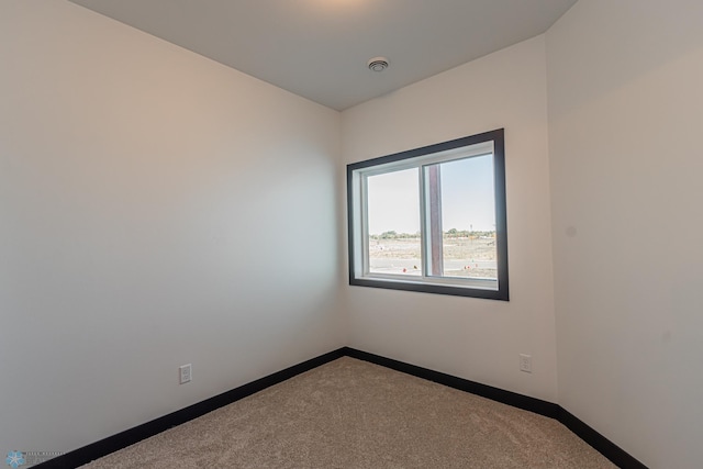 empty room with carpet floors