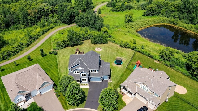 birds eye view of property featuring a water view