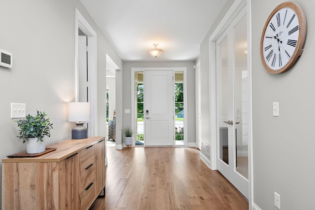 entrance foyer with light wood-type flooring