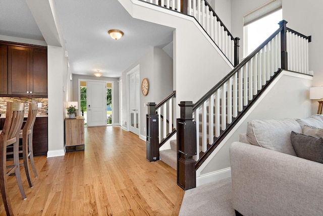 foyer entrance featuring light hardwood / wood-style floors