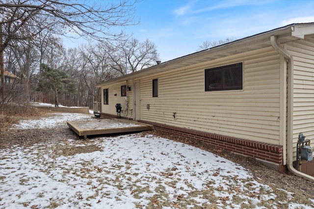 view of snow covered property