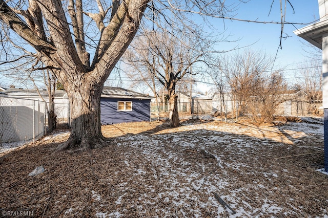 view of yard covered in snow