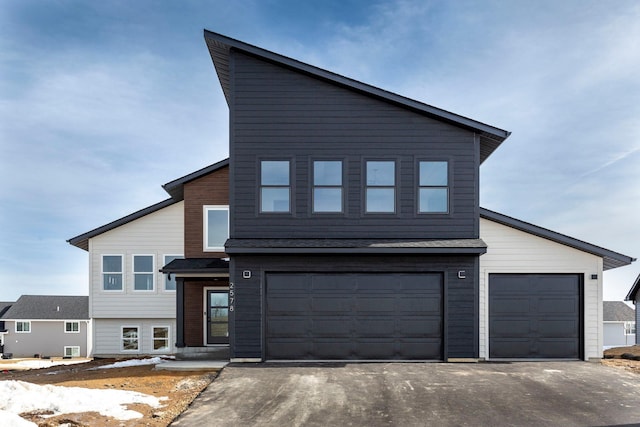 modern home featuring driveway