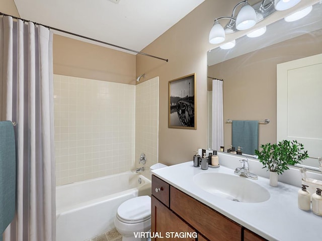 full bathroom with vanity, toilet, and shower / bath combo with shower curtain