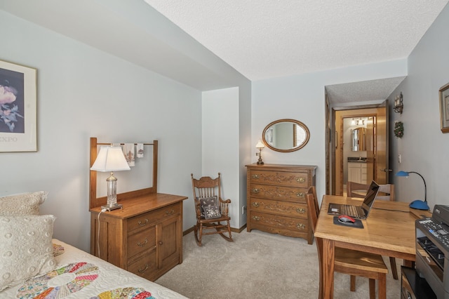 carpeted bedroom featuring a textured ceiling