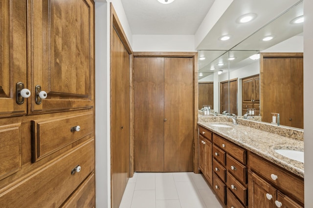 bathroom featuring vanity and tile patterned floors