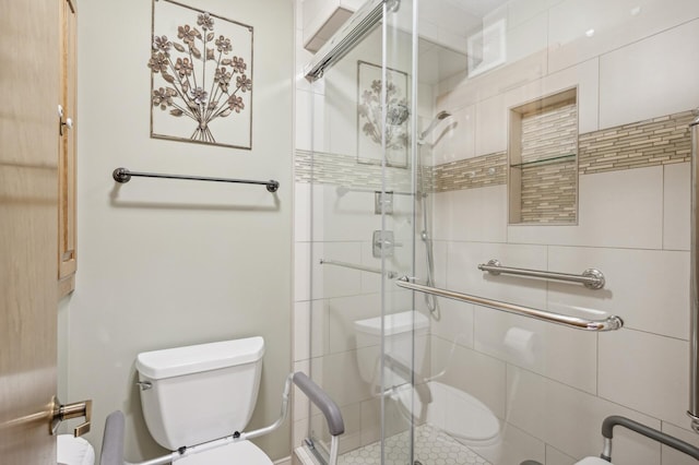 bathroom featuring an enclosed shower and toilet